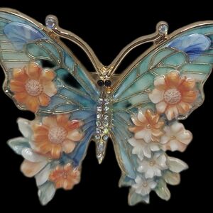 Elegant Butterfly Brooch with Floral Accents